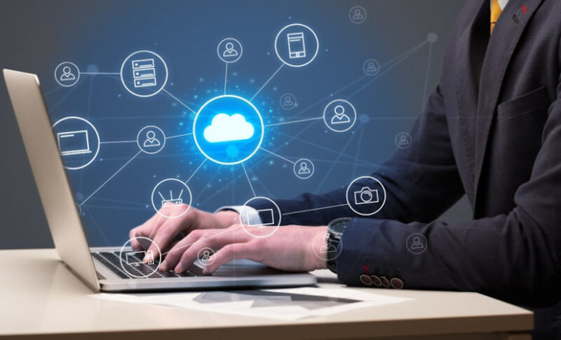 Businessman hand typing with cloud technology system and office symbol concept MicroStrategy One