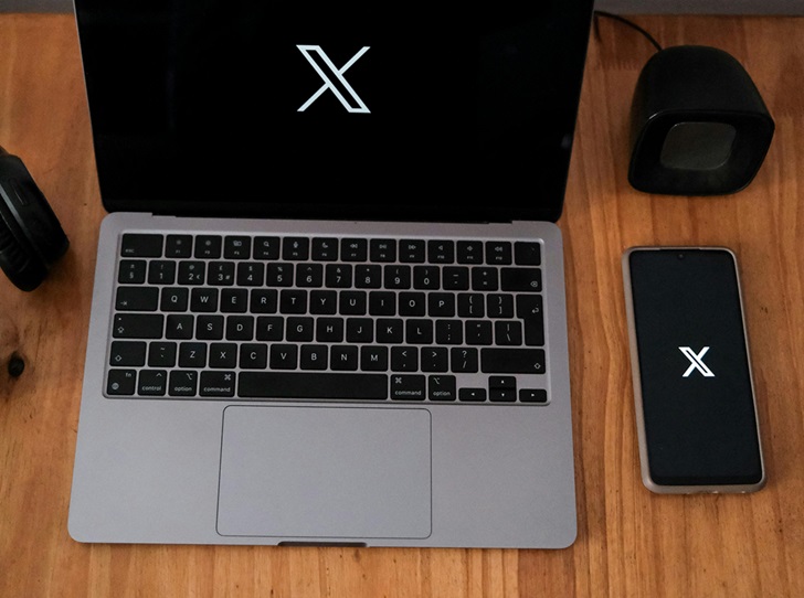 X en laptop y smartphone Grok