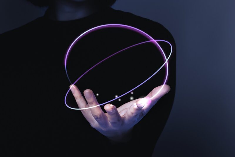 Woman’s hand presenting futuristic technology digital remi Forrester
